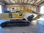  Side of used Komatsu Excavator in yard